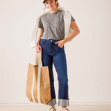MERSEA women's travel-friendly rinse blue straight-leg denim jeans with cuffed hems.