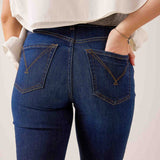 Dark rinse denim straight-leg jeans featuring a western-inspired stitched pocket design.