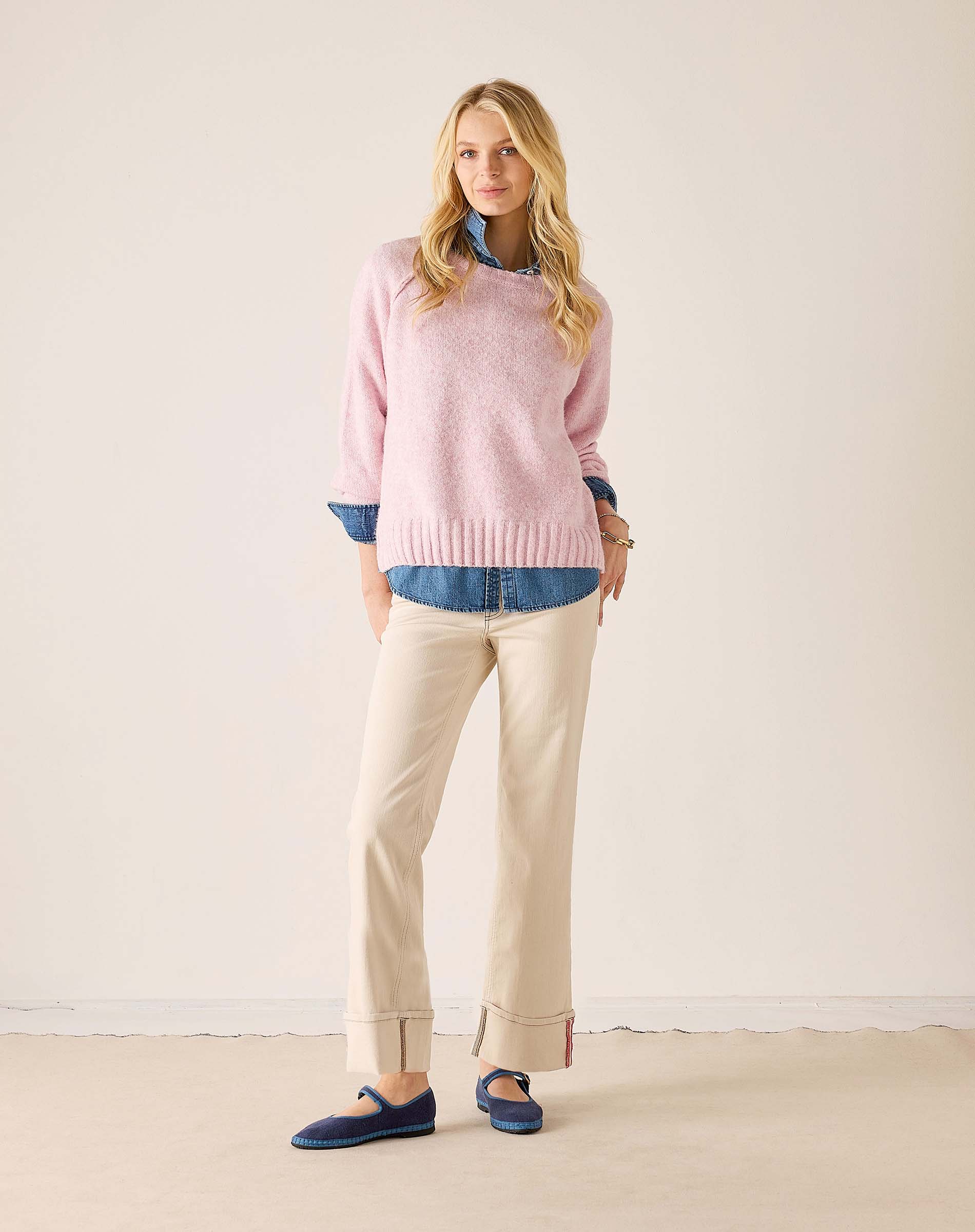 Women's travel-friendly bliss pink raglan knit sweater with a cozy textured finish.
