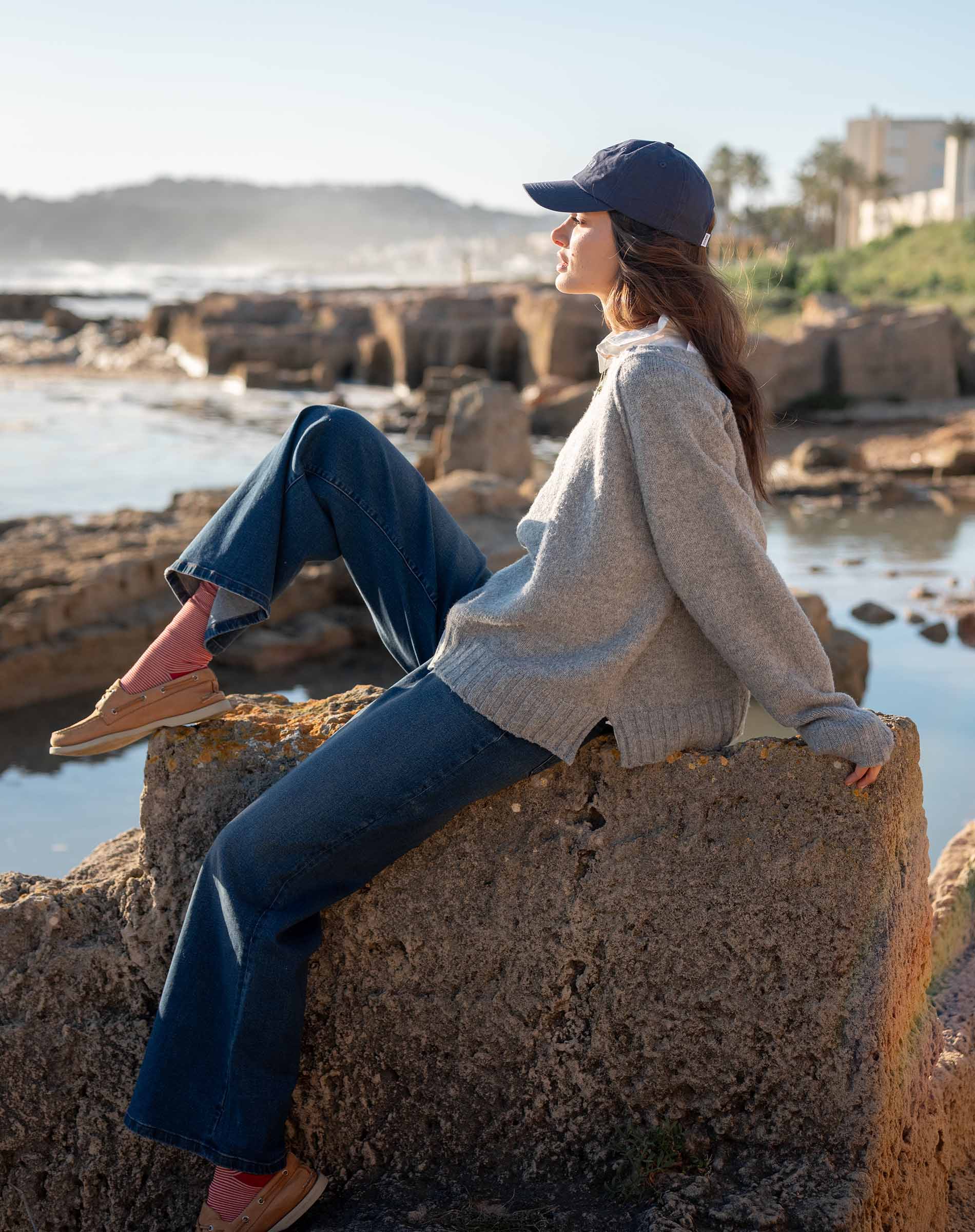 Ladies' travel-ready dove gray raglan knit sweater with a relaxed fit and dropped shoulders.