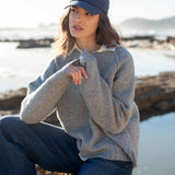 Dovetail grey raglan sweater with a soft knit texture and drop shoulder design.