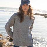 Dovetail gray raglan knit sweater with a ribbed hem.