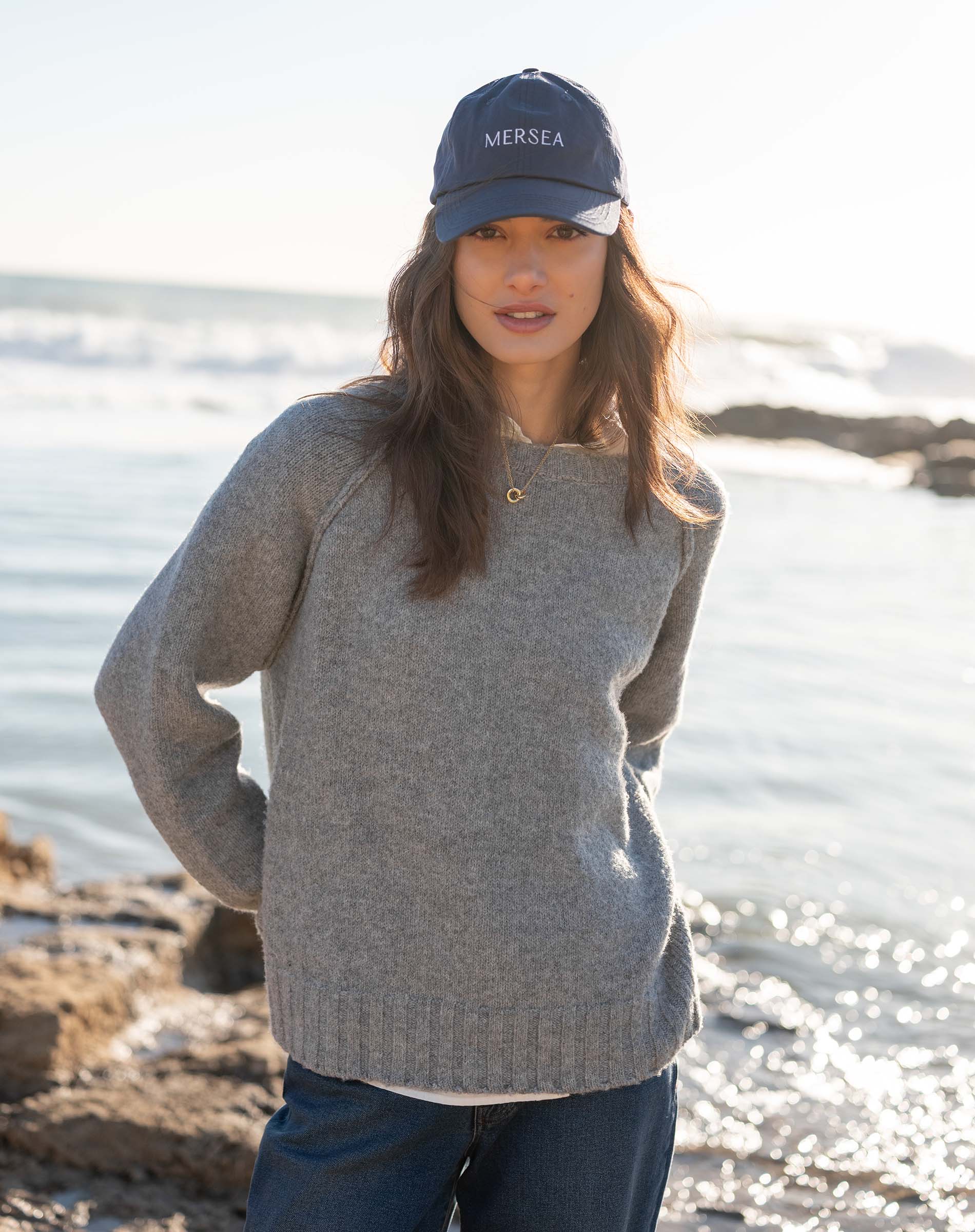 Dovetail gray raglan knit sweater with a ribbed hem.