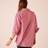 Back view of a cardinal pinstripe button-up shirt featuring a relaxed fit and striped pattern.