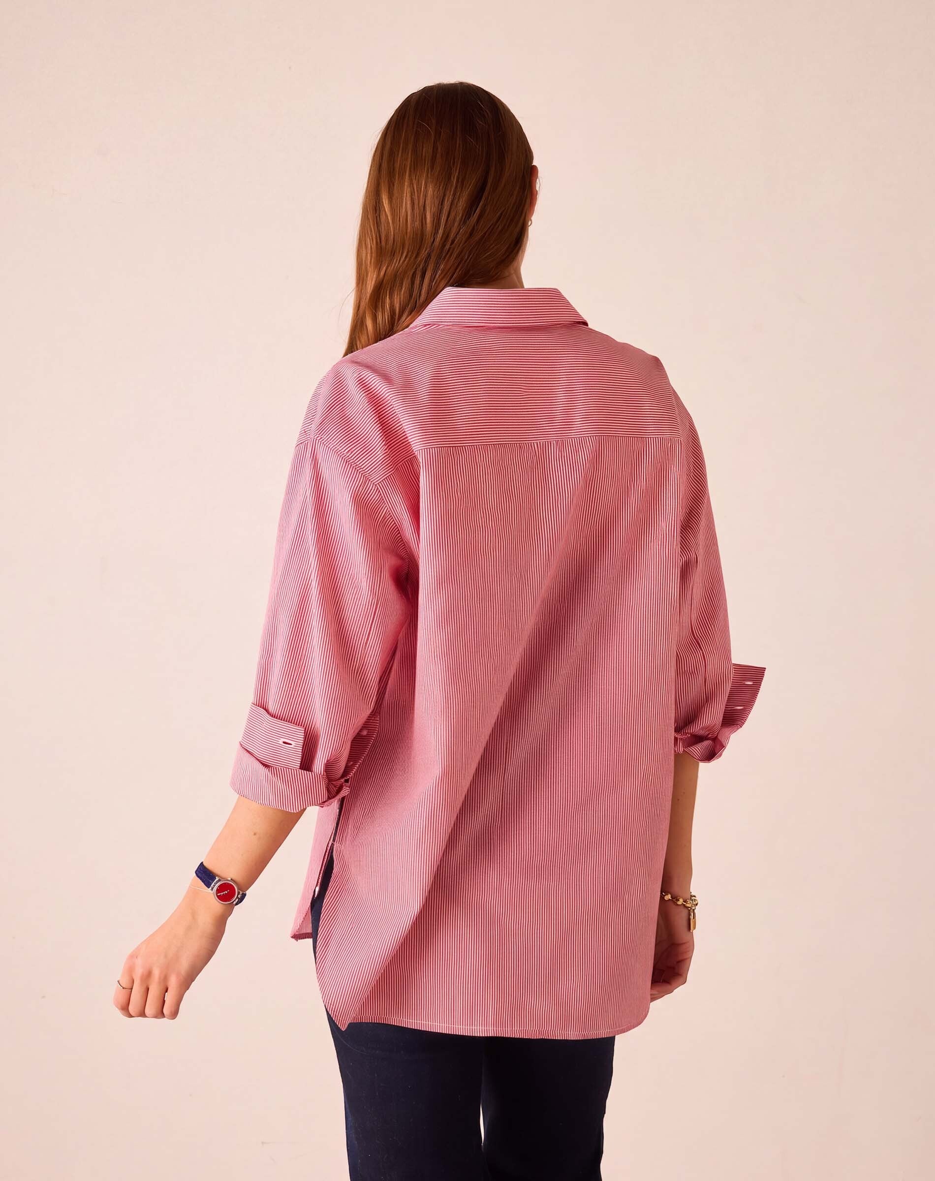 Back view of a cardinal pinstripe button-up shirt featuring a relaxed fit and striped pattern.