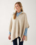 woman wearing mersea cambridge collar poncho in oatmeal beige