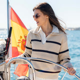 Cream and navy striped knit sweater with a collar over a white shirt. Text: MERCURY