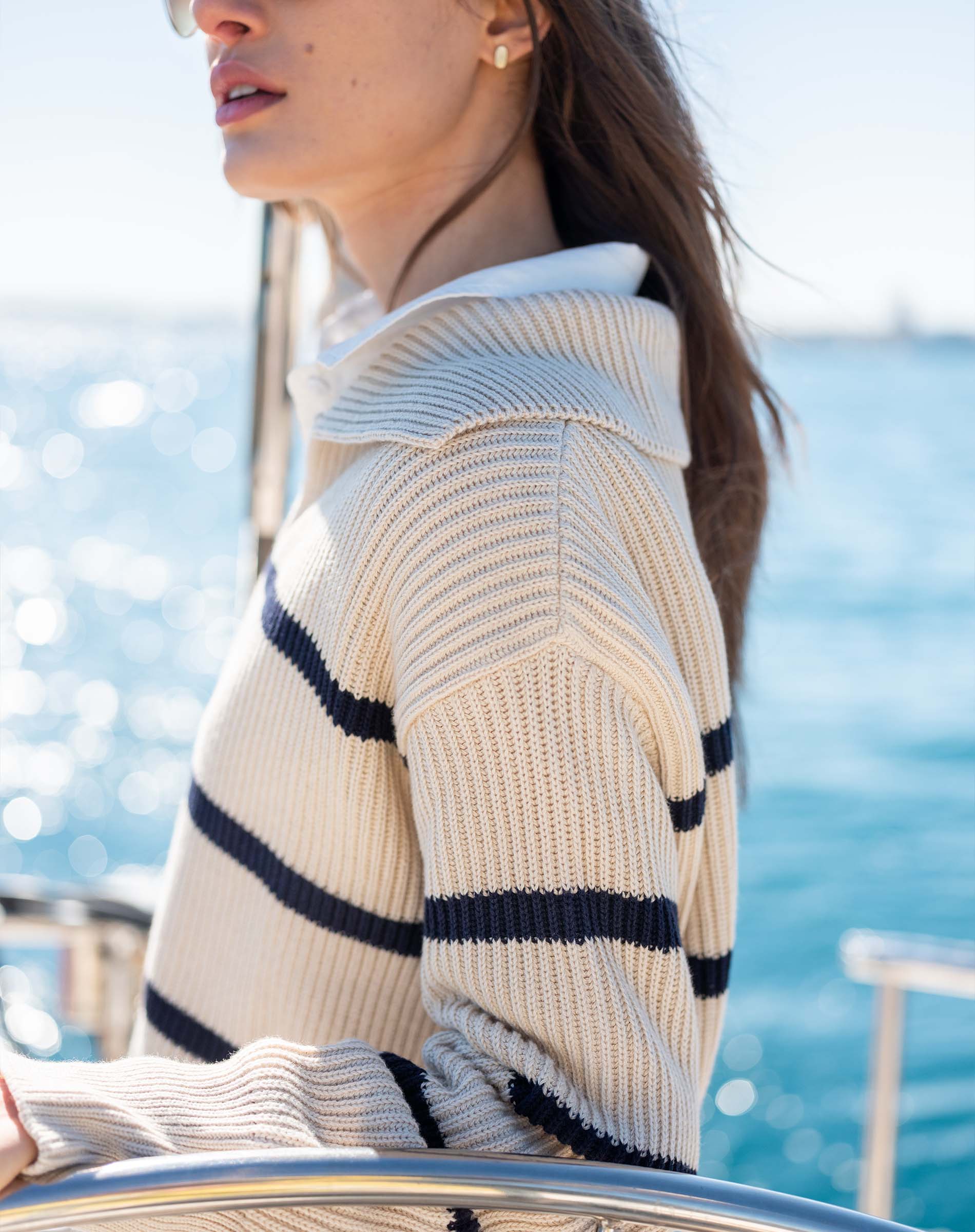 Cream and navy striped knit sweater with a sailor collar.