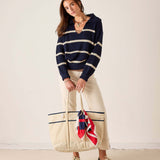 MERSEA women's travel-friendly navy and cream striped knit sweater with a boat neck and long sleeves.