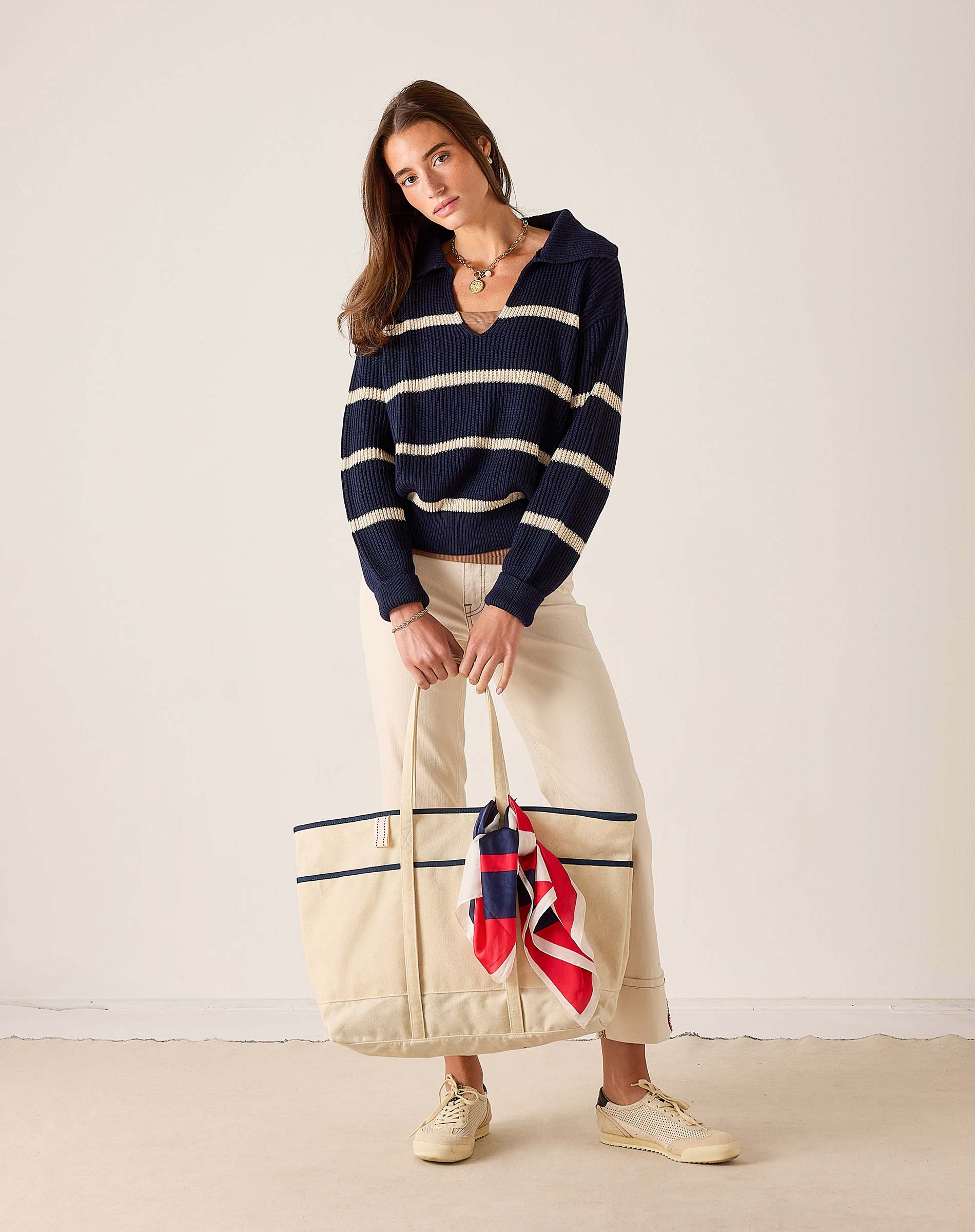 MERSEA women's travel-friendly navy and cream striped knit sweater with a boat neck and long sleeves.