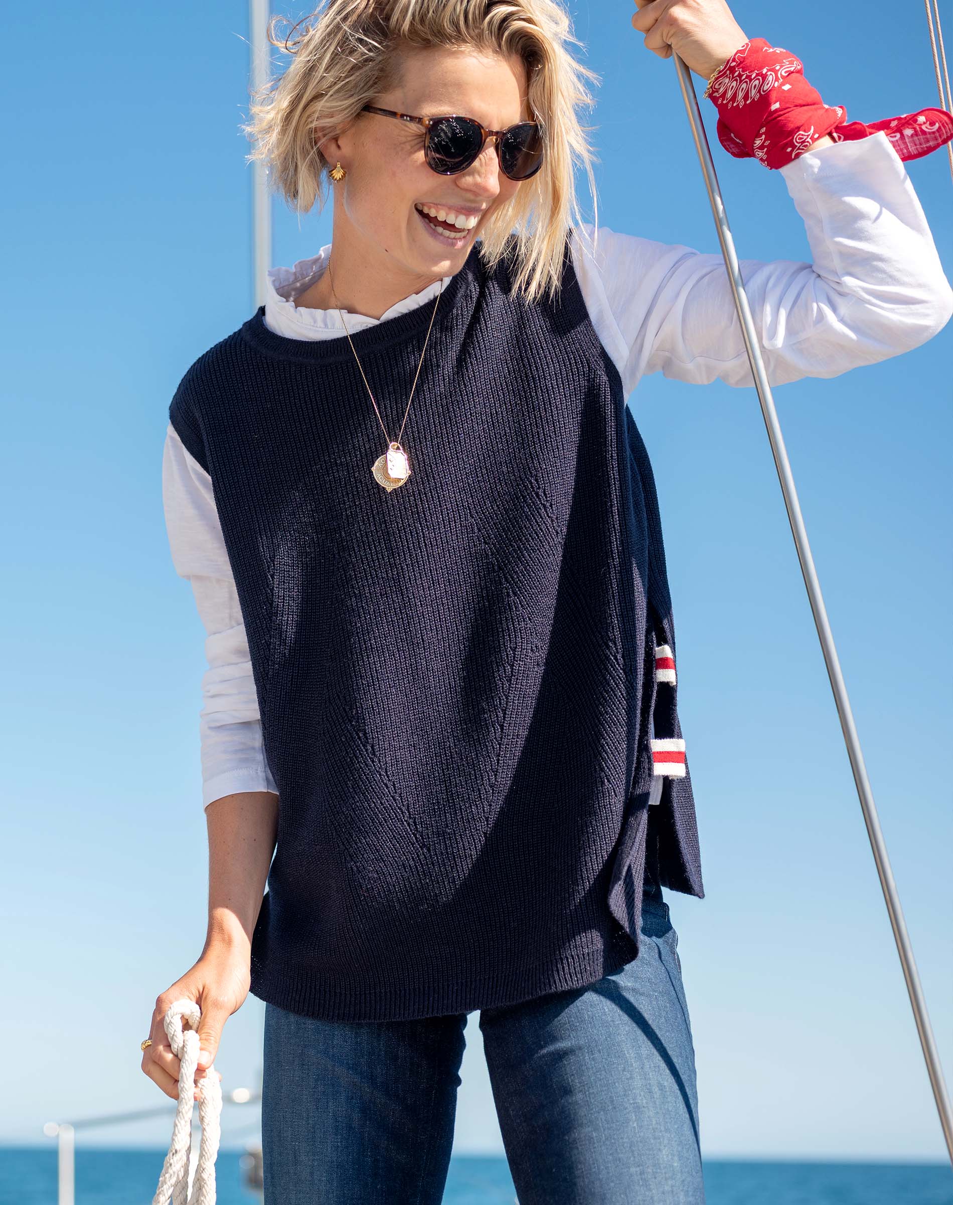 MERSEA women's travel-friendly navy blue knit vest with a ribbed texture and relaxed fit.