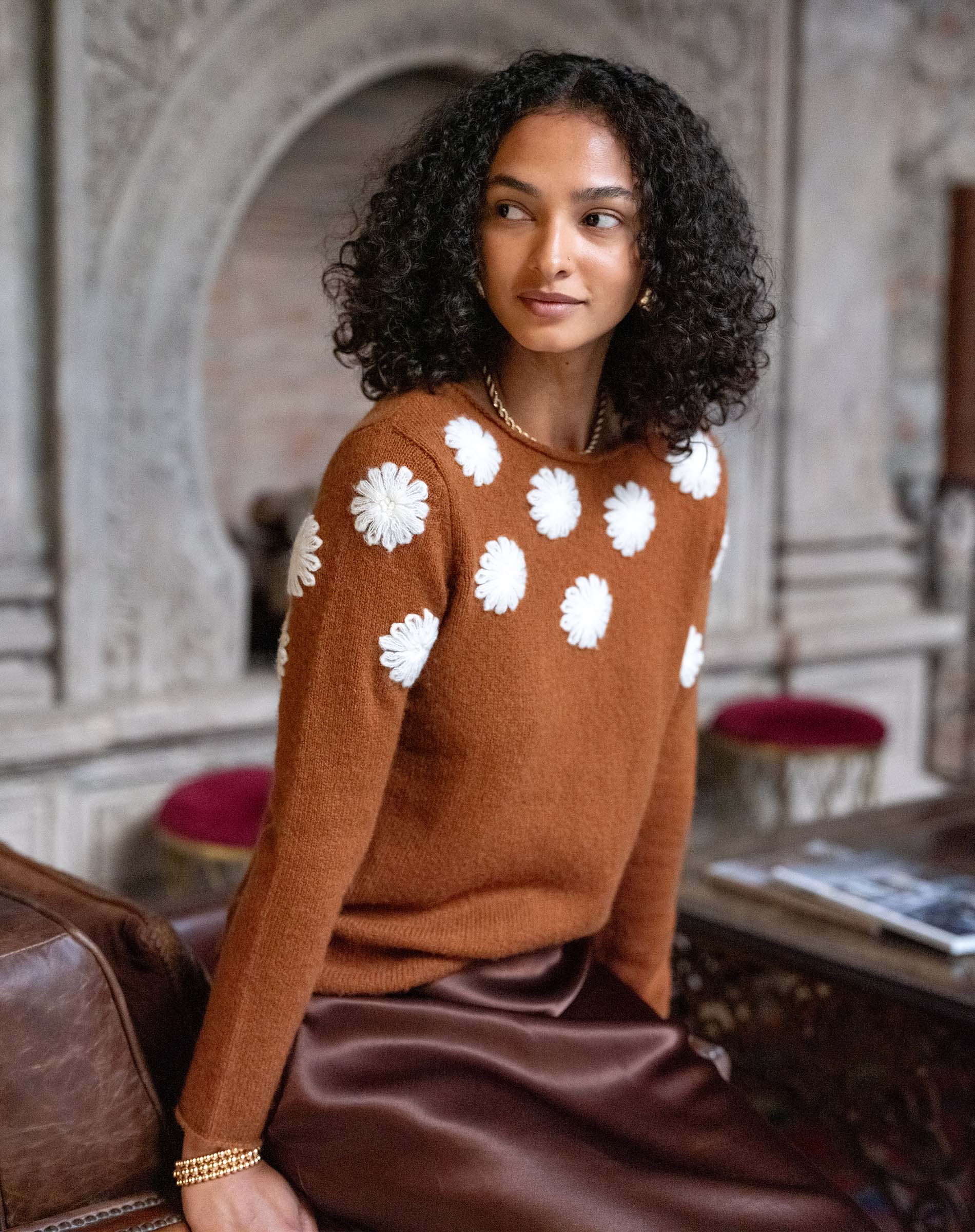 Cinder colored cashmere sweater with ivory camellia flower embroidery.