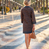 Back view of the rinse chambray dress with a geometric pattern and three-quarter sleeves.