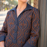 Camille chambray dress in rinse with a patterned front and button-up closure.