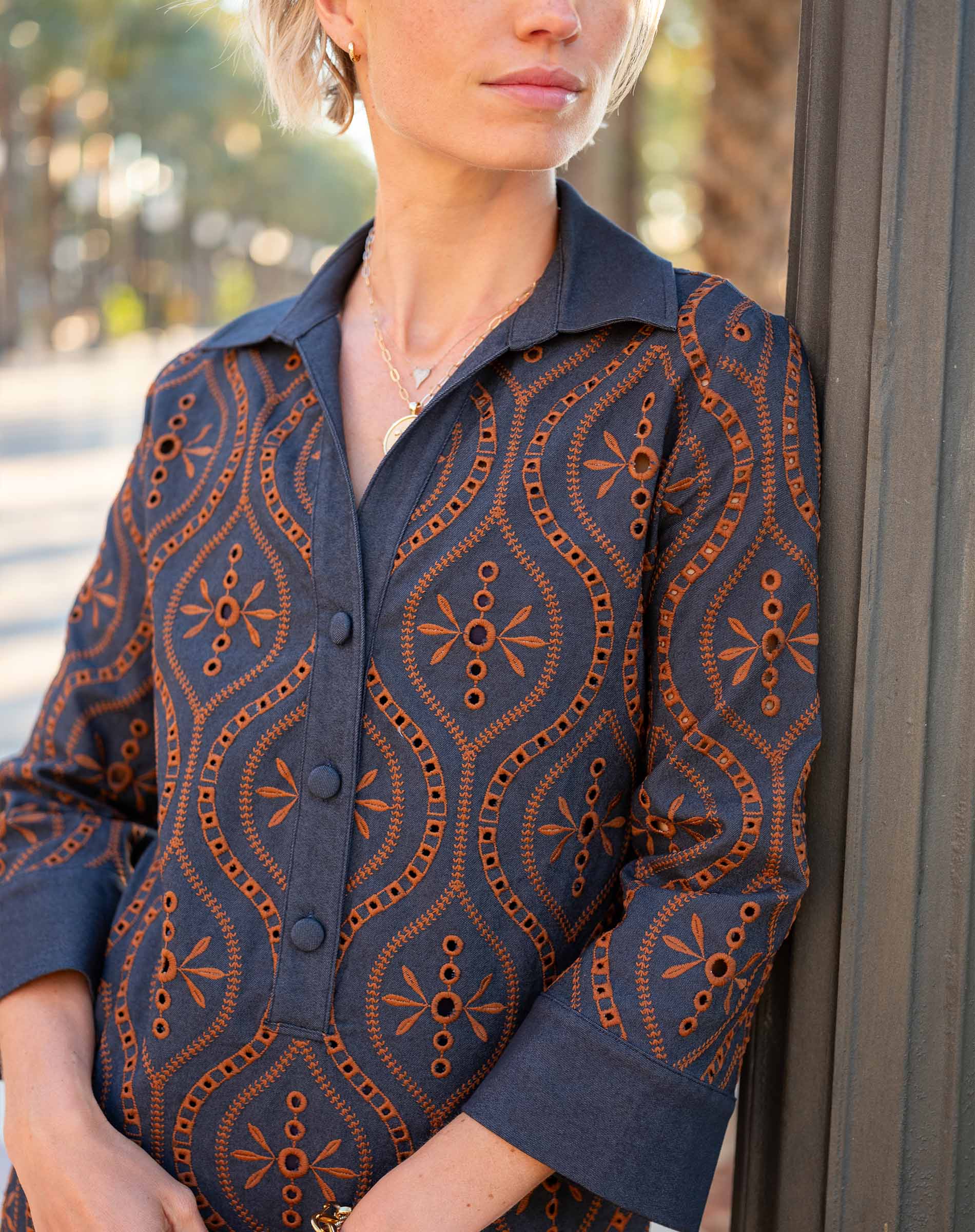 Camille chambray dress in rinse with a patterned front and button-up closure.