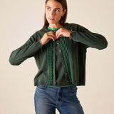 Ladies' travel-ready pine green knit cardigan with ruffled trim and button front.