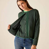 Pine green knit cardigan with ruffle detail and button front.