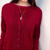 Ladies' travel-ready wine red ribbed knit cardigan with button front and textured vertical stripe detailing.