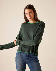 Pine green knit sweater with a lime green trim along the neckline and hem.