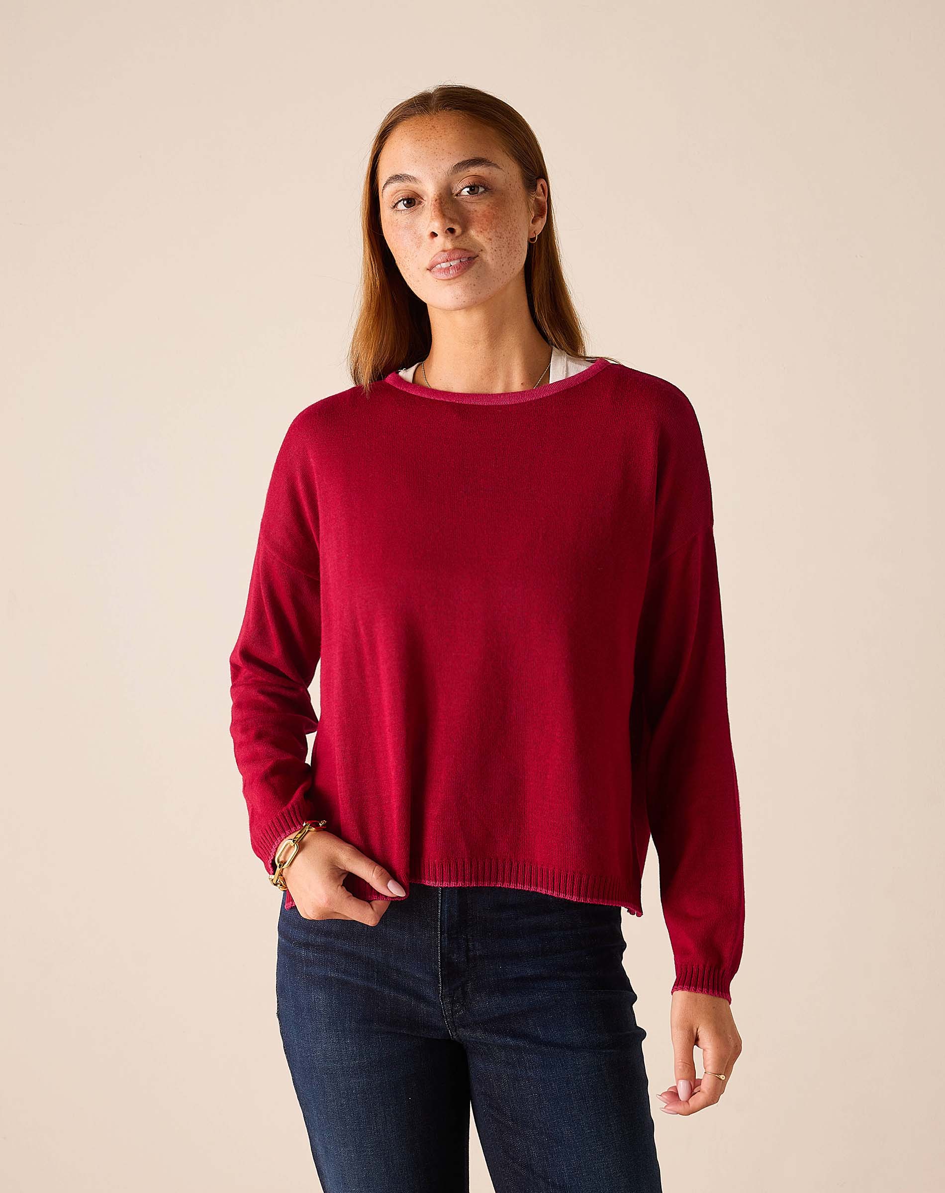 MERSEA women's travel-friendly wine red knit sweater with long sleeves and a rounded neckline.