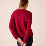Back view of the wine color knit cardigan with ribbed trim and long sleeves.