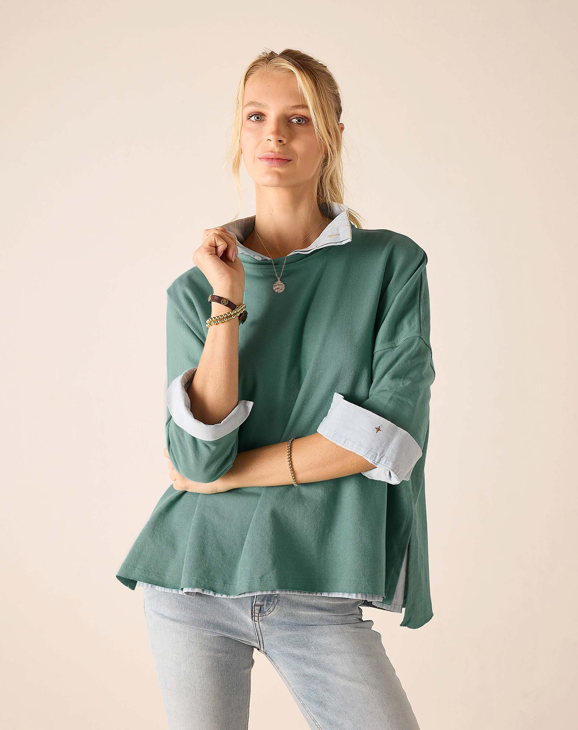 Aqua blue teal-toned rustic tee with contrast light blue collar and cuffs.