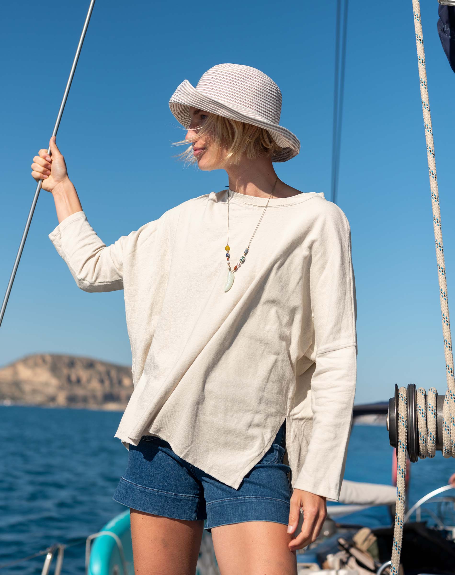 MERSEA women's travel-friendly bone-colored rustic tee with a relaxed fit and three-quarter length sleeves.