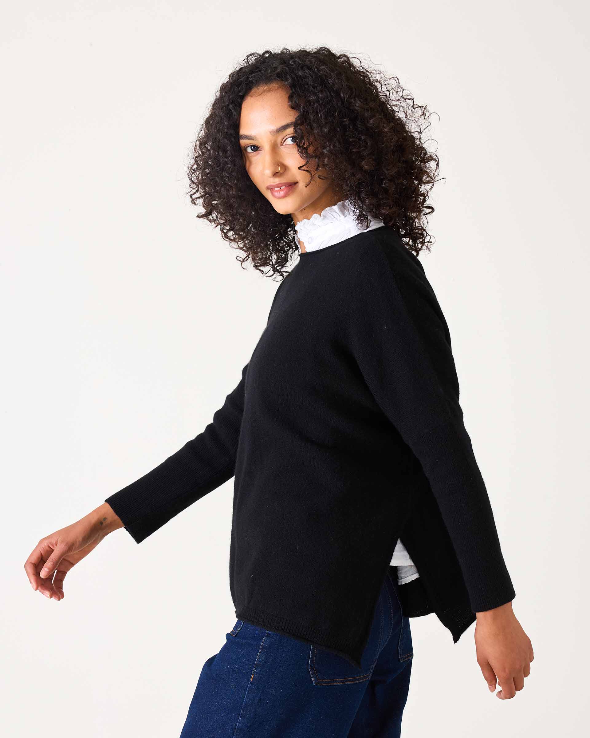 Black relaxed fit cashmere sweater with a soft knit finish.