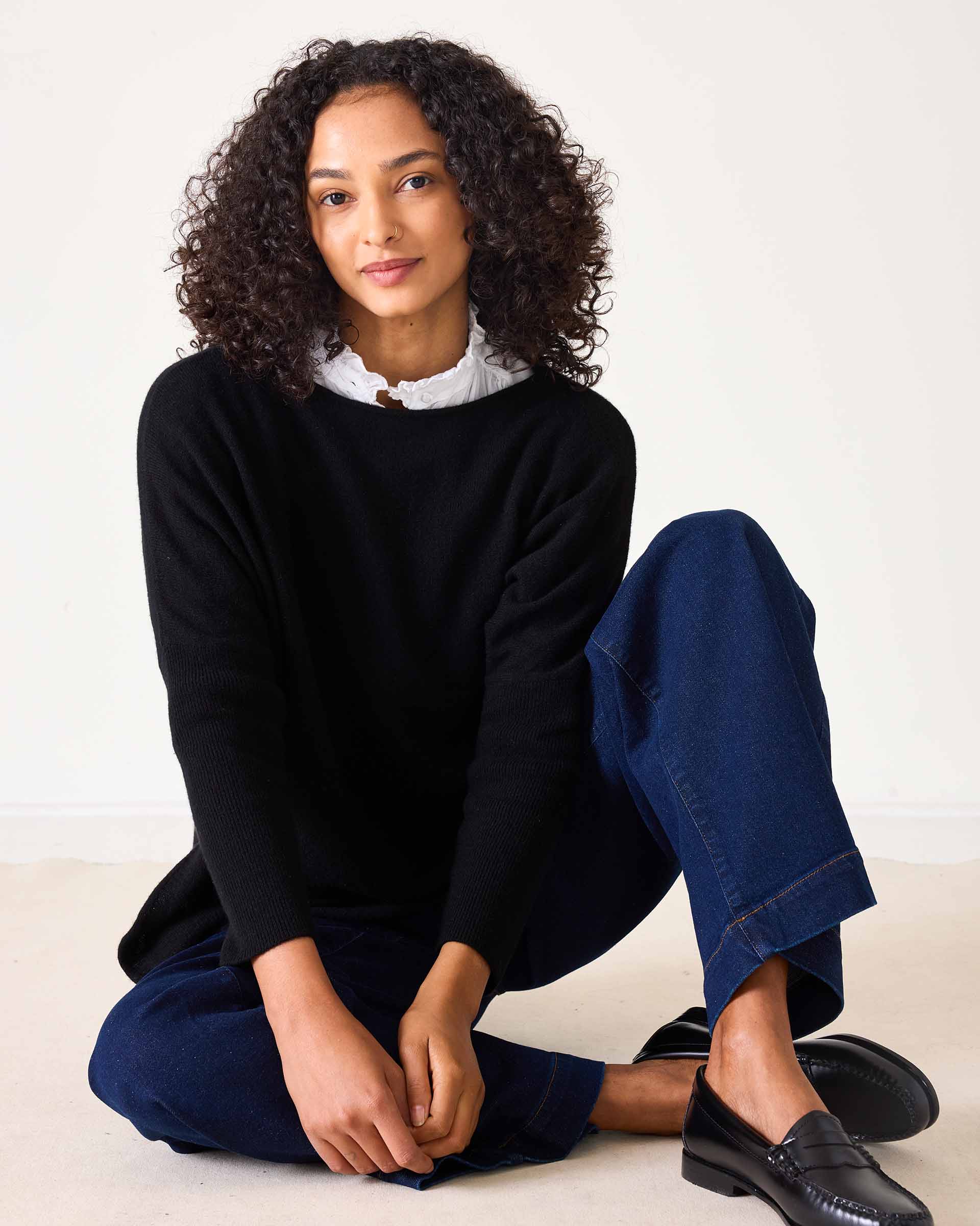Black cashmere crewneck sweater.