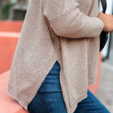 Toast colored cashmere sweater with a soft knit weave and side slit detail