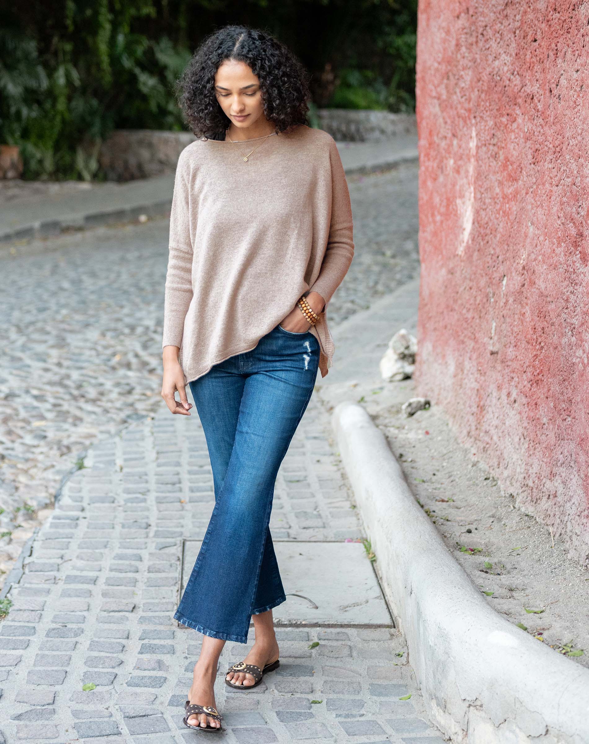 Toast color oversized knit cashmere sweater with dropped shoulders and relaxed fit.