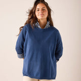 Ladies' travel-ready yale blue relaxed-fit cashmere sweater featuring a striped mock neck and striped cuff details.