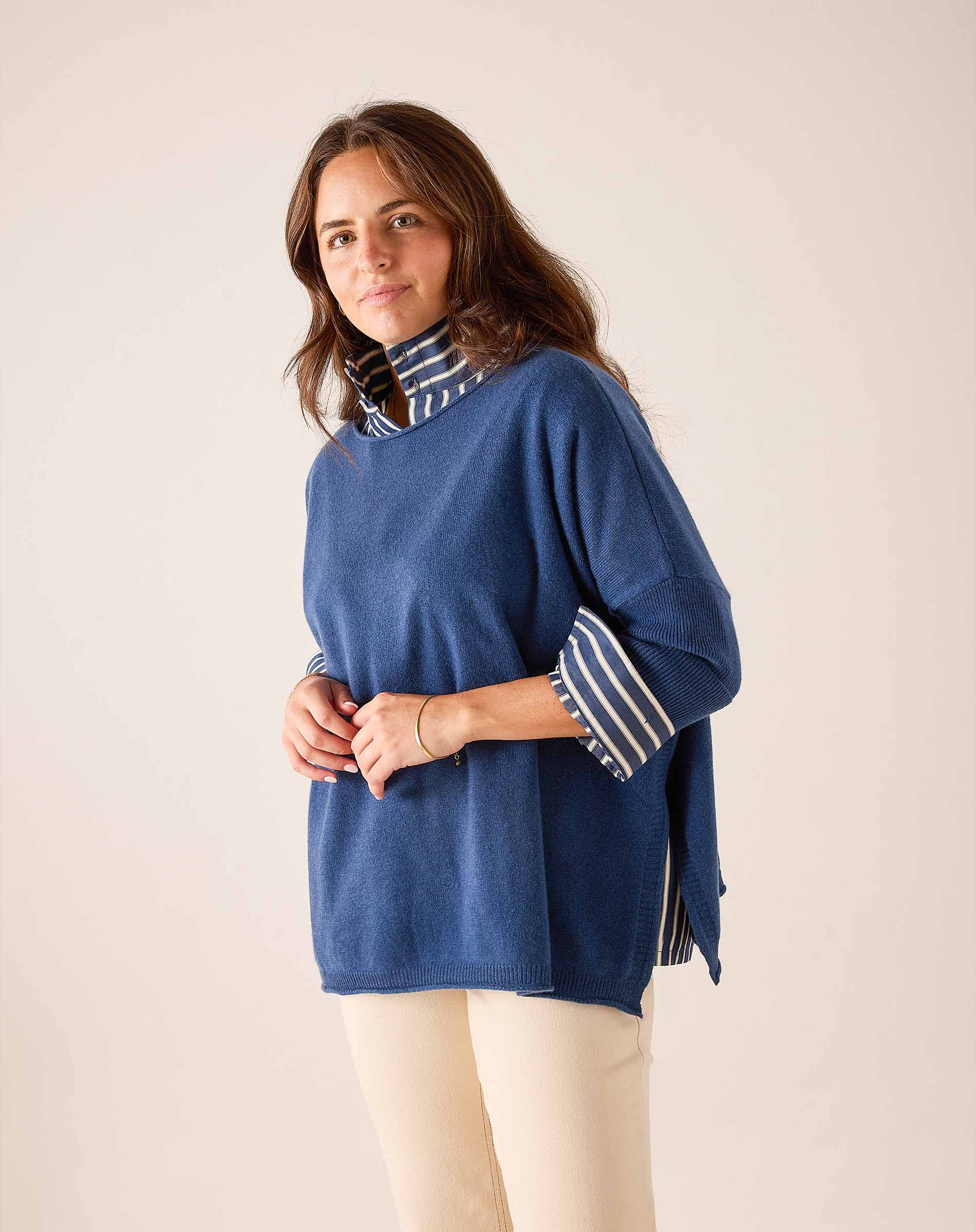 Yale Blue cashmere sweater with striped mock neck and cuffs.