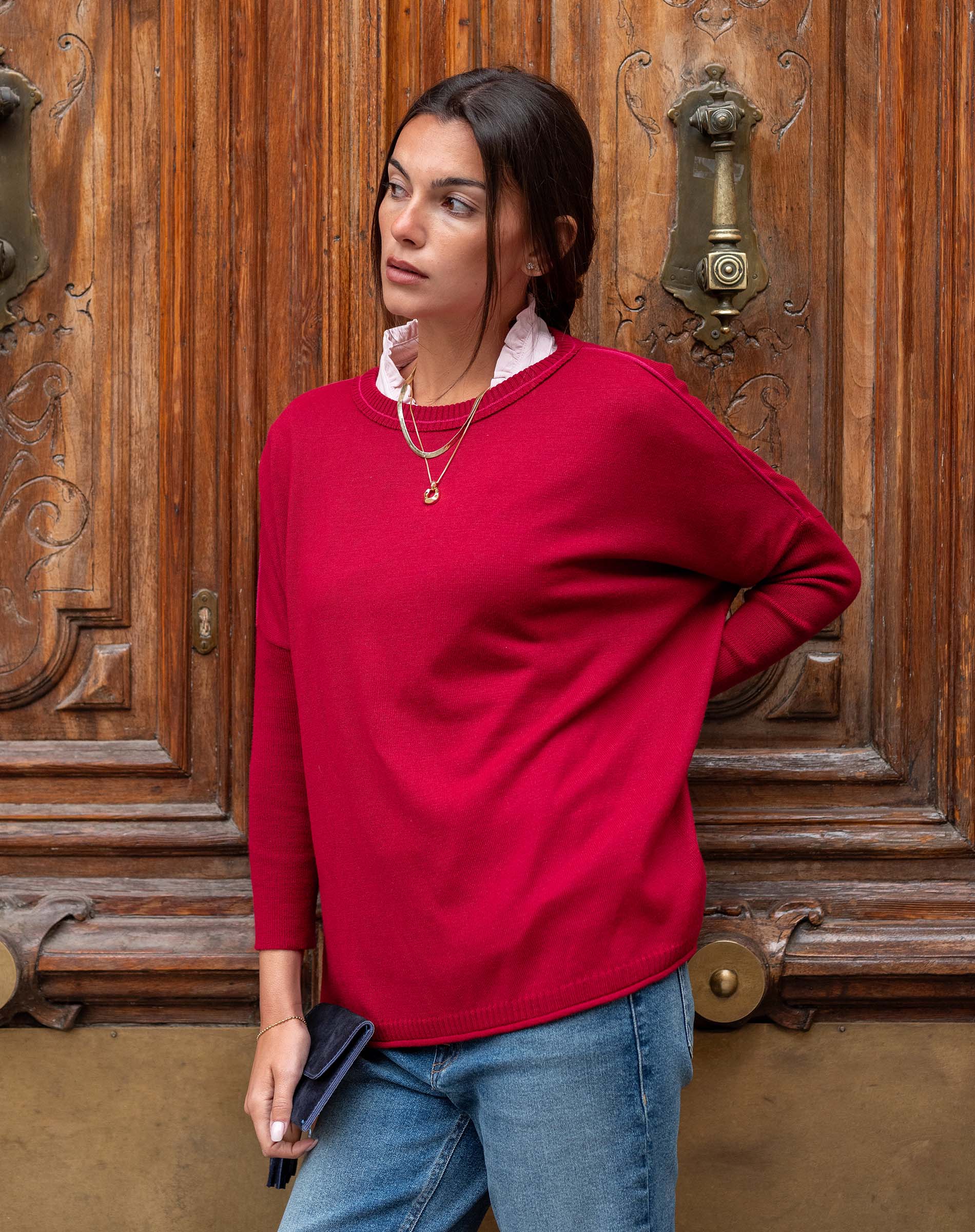 MERSEA ladies' travel-ready pinkberry crewneck knit top with a high neckline and long sleeves.