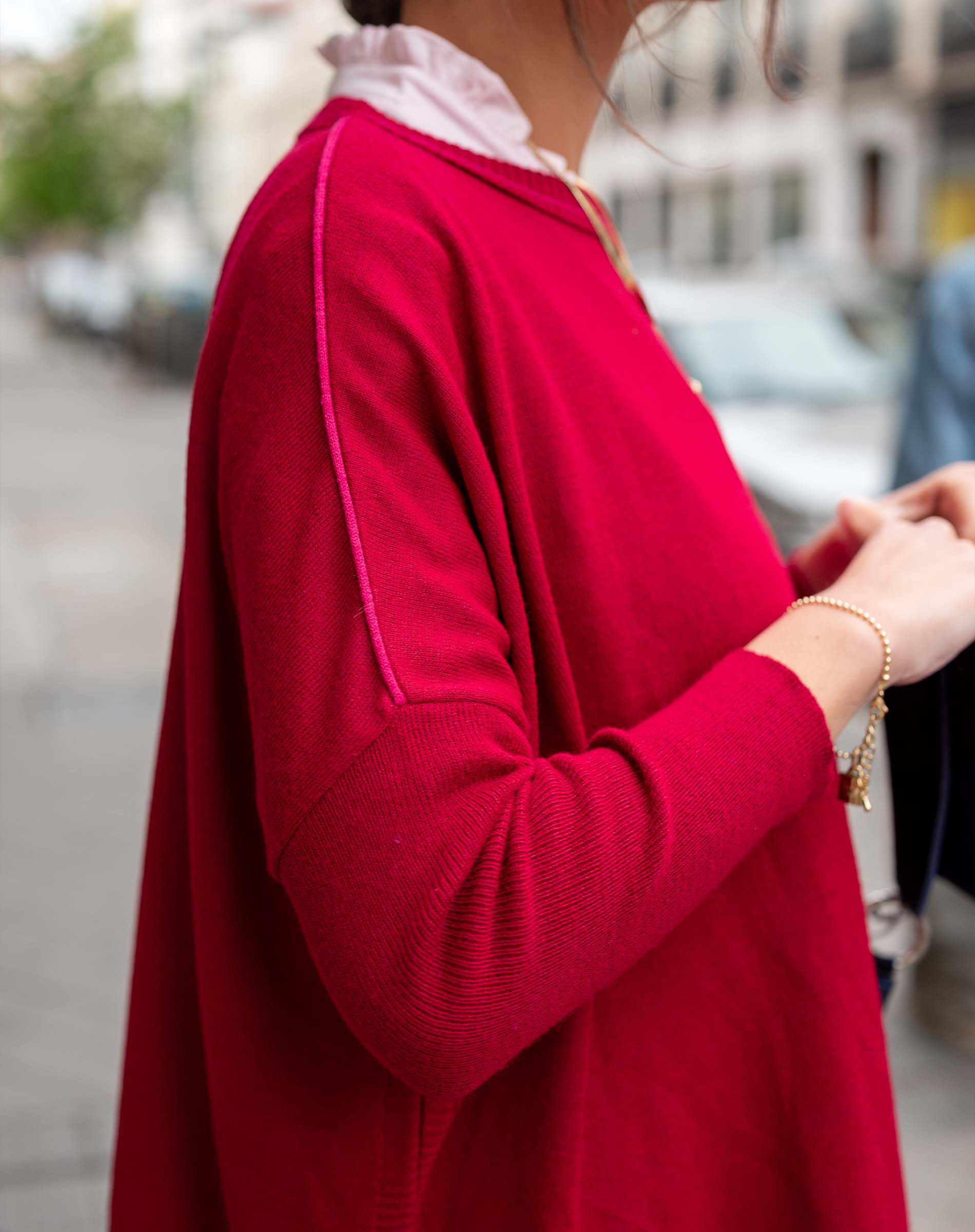 Wine pinkberry knit top with a contrasting crewneck line and long sleeves.