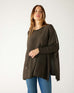 woman wearing mersea catalina contrast sweater in cocoa with white  trim