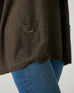 closeup of pocket on woman wearing mersea catalina contrast sweater in cocoa with white trim