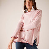 MERSEA women's travel-friendly light orchid cotton ruffled sweater with a wide neckline and frayed hem.