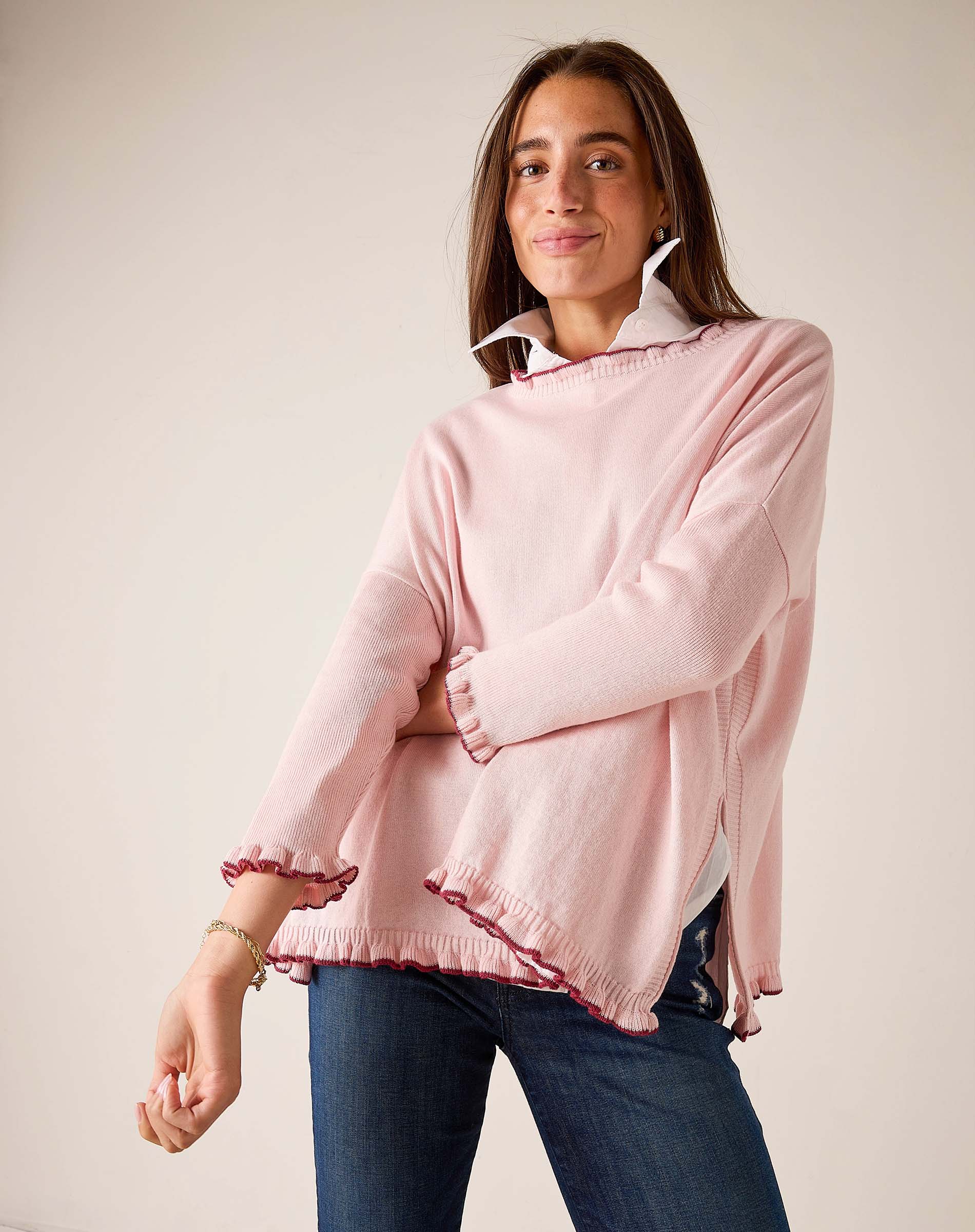 MERSEA women's travel-friendly light orchid cotton ruffled sweater with a wide neckline and frayed hem.