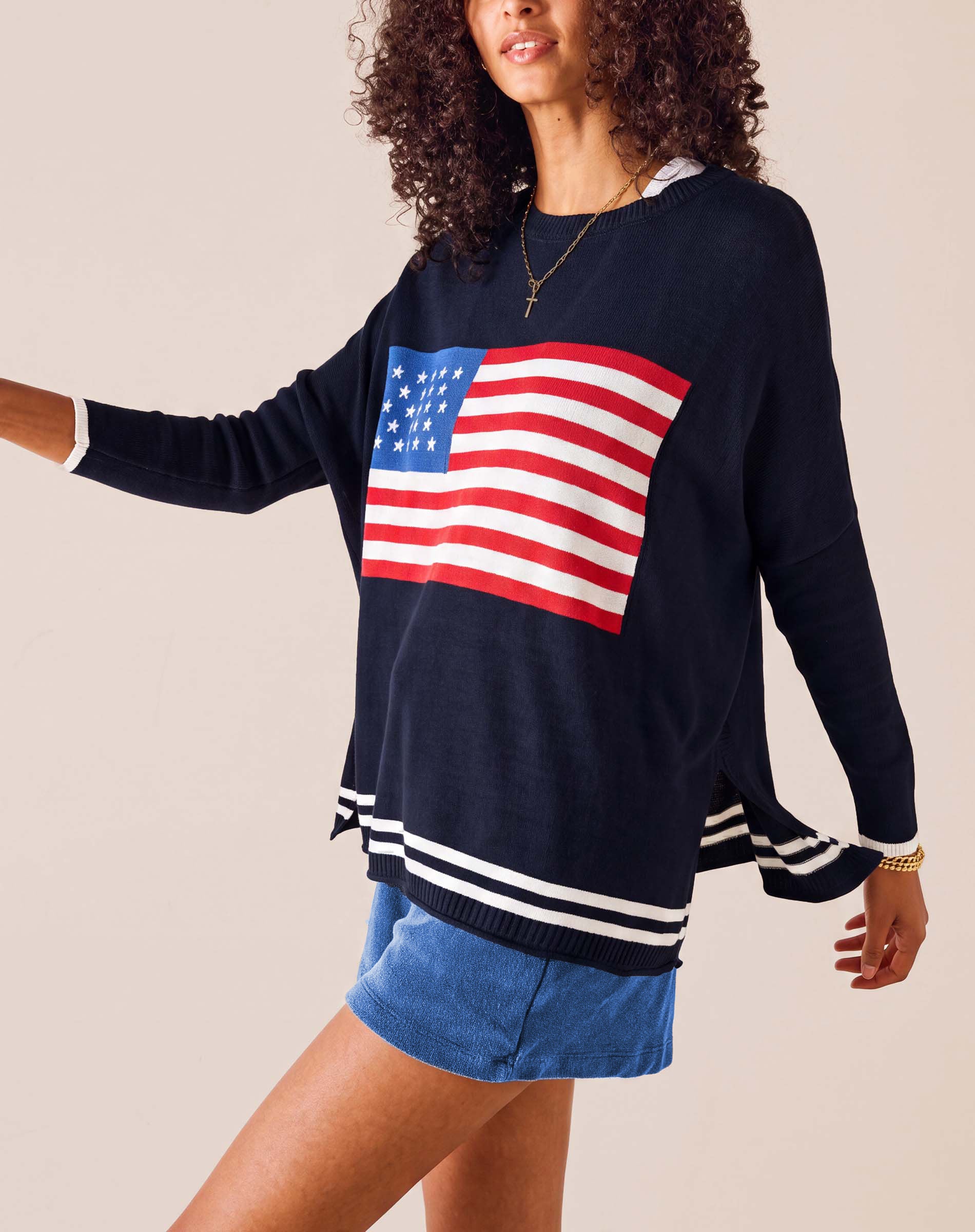 MERSEA women's travel-friendly navy blue knit crewneck top featuring a large American flag graphic.