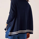 MERSEA ladies' travel-ready back view of the navy blue knit crewneck top with white stripes on the hem.