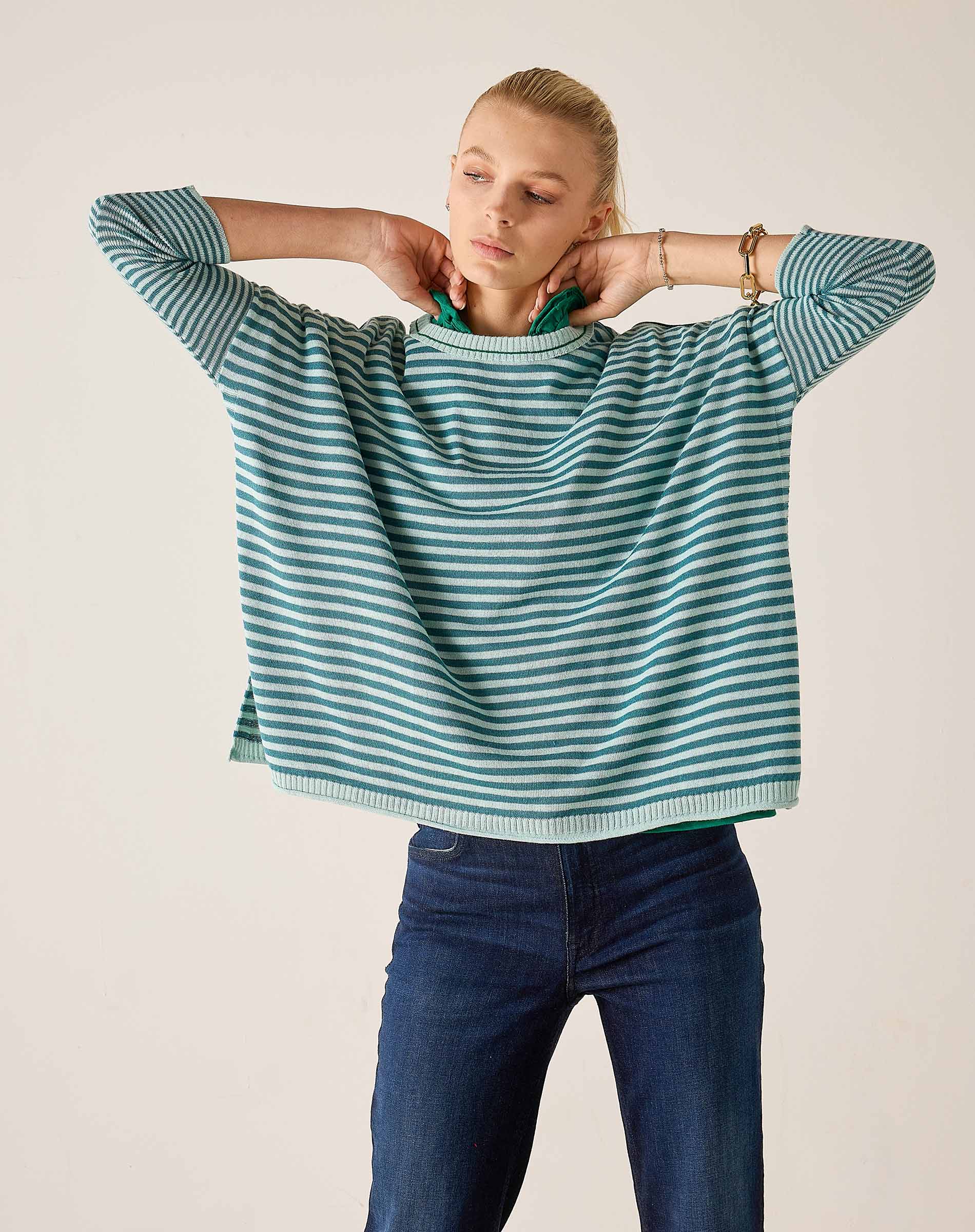 MERSEA ladies' travel-ready women's travel-friendly teal and white striped knit crewneck top with long sleeves.