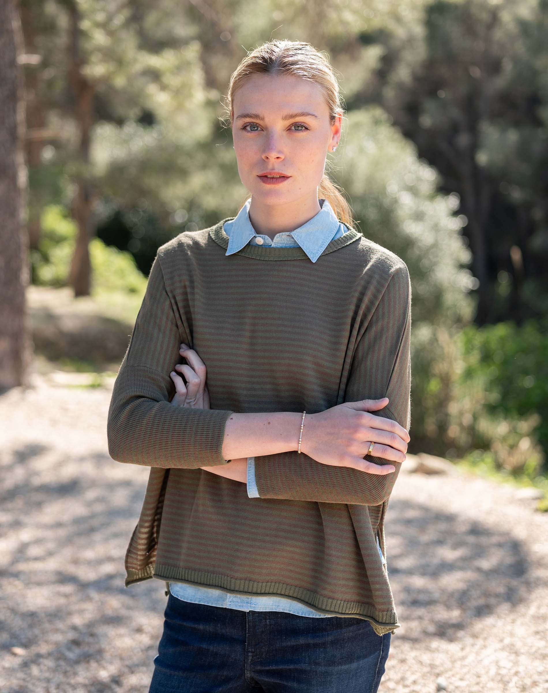 MERSEA ladies' travel-ready women's travel-friendly olive green horizontal stripe knit top with a collar and long sleeves.