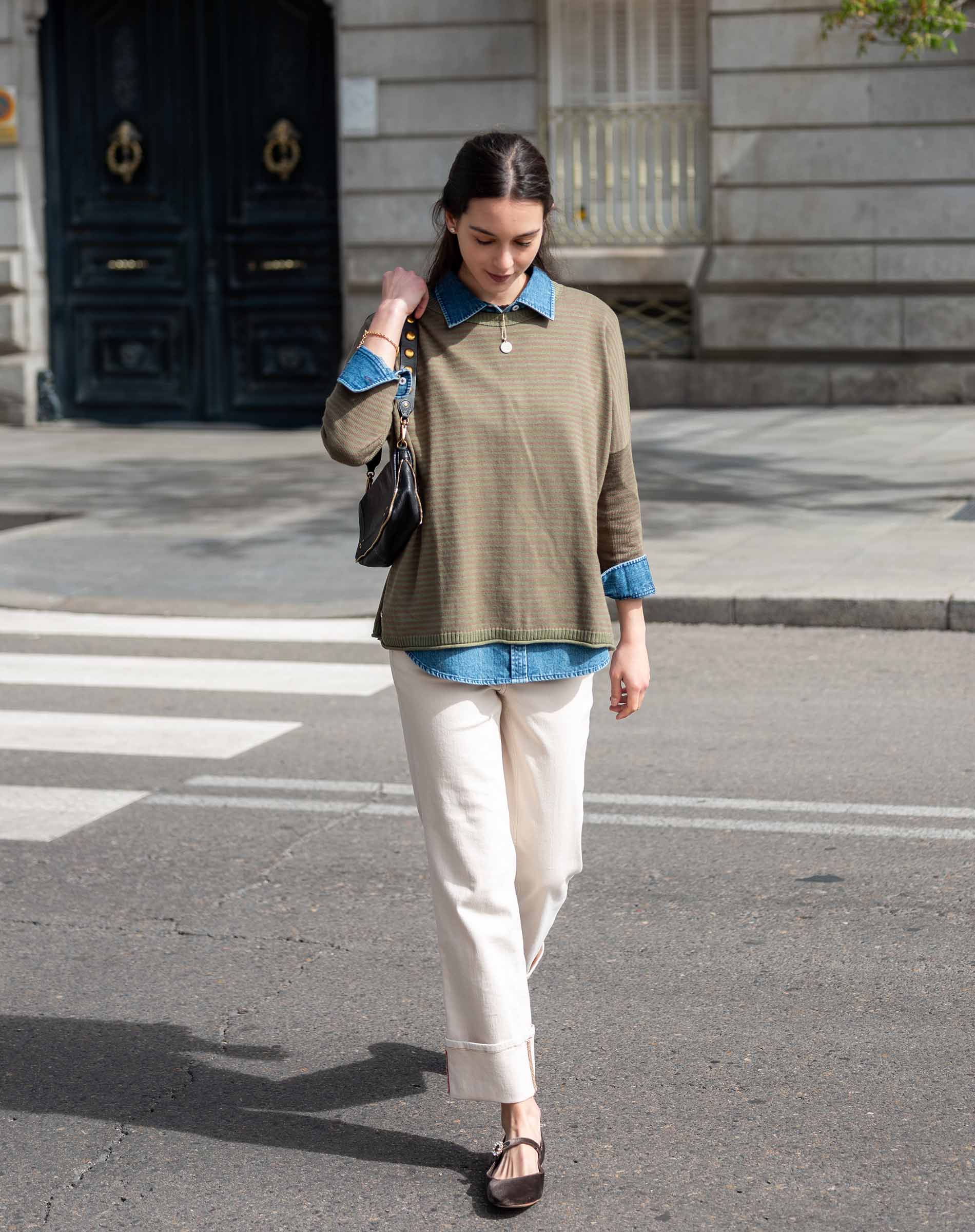 Olive green crewneck knit top with a subtle stripe and long sleeves.