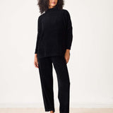 Ladies' travel-ready black chenille knit sweater with a relaxed fit and long sleeves.