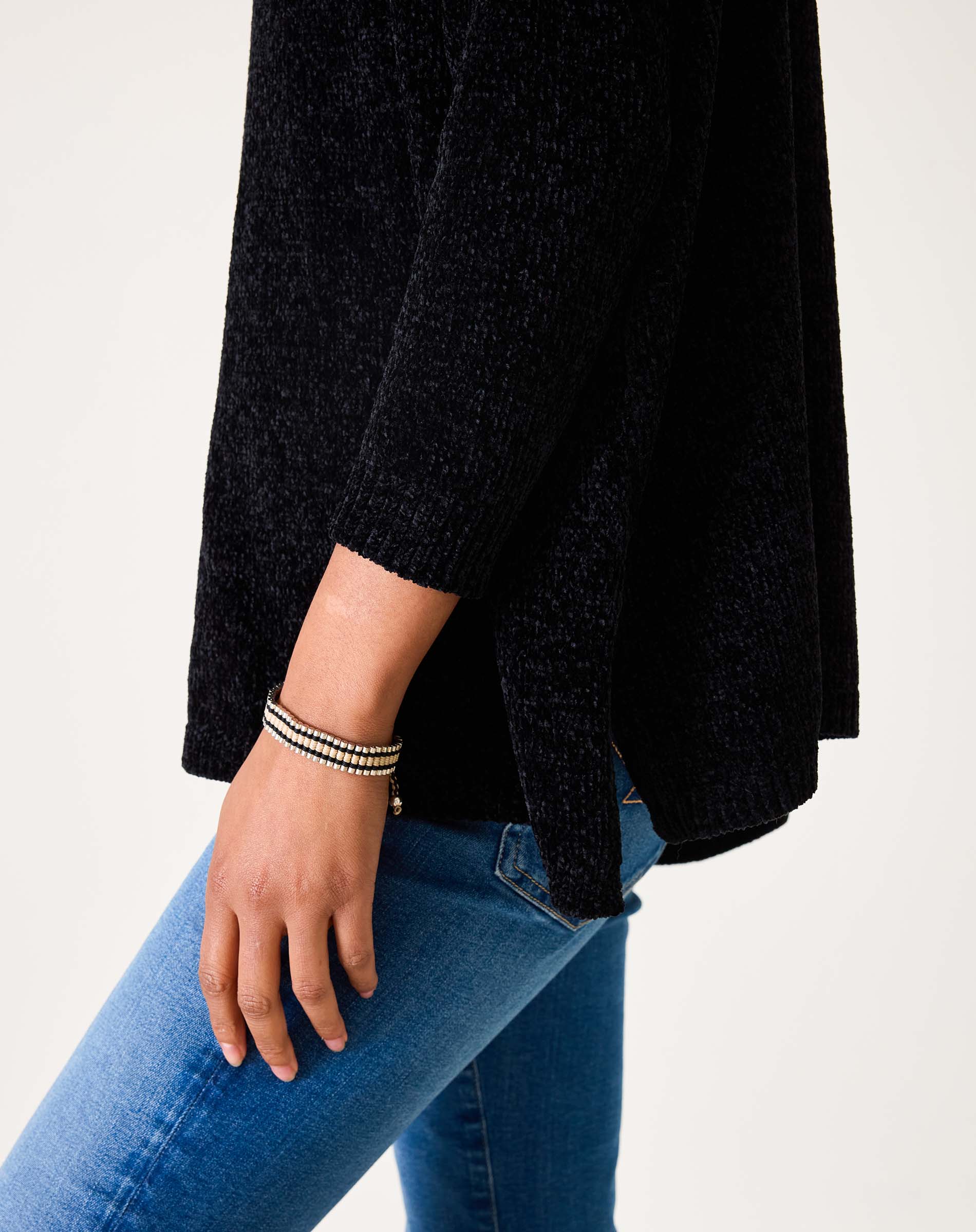 Black chenille sweater with a relaxed fit and textured weave.