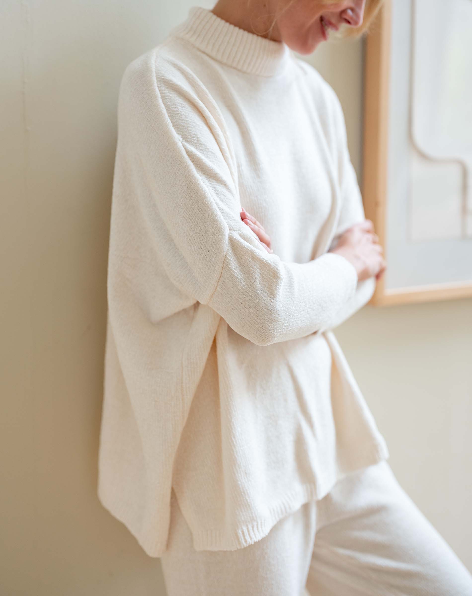 Cream chenille sweater with high neck and relaxed fit