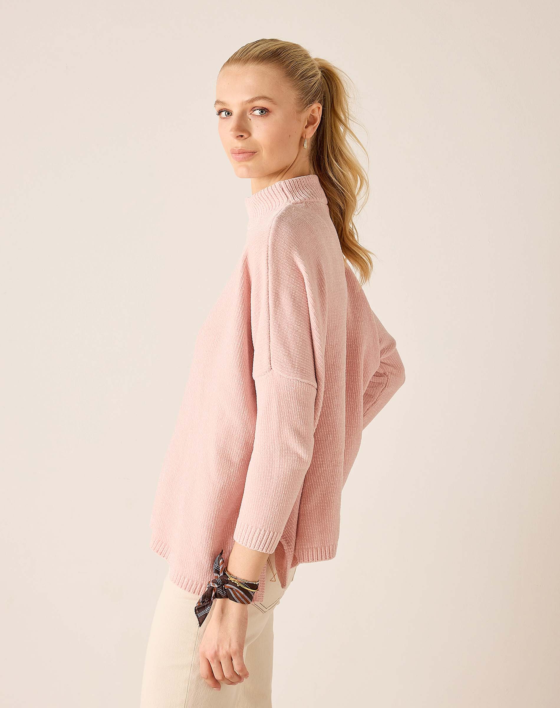 Ballet pink mockneck knit sweater with ribbed cuffs and hem.