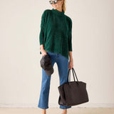 Women's travel-friendly everglade green mockneck sweater in a soft knit fabric.