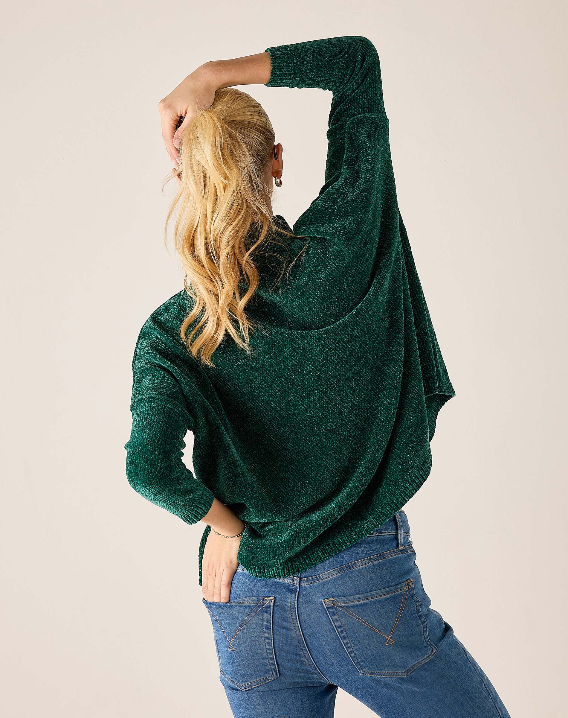 Everglade green mockneck sweater in a soft knit fabric with an oversized fit.